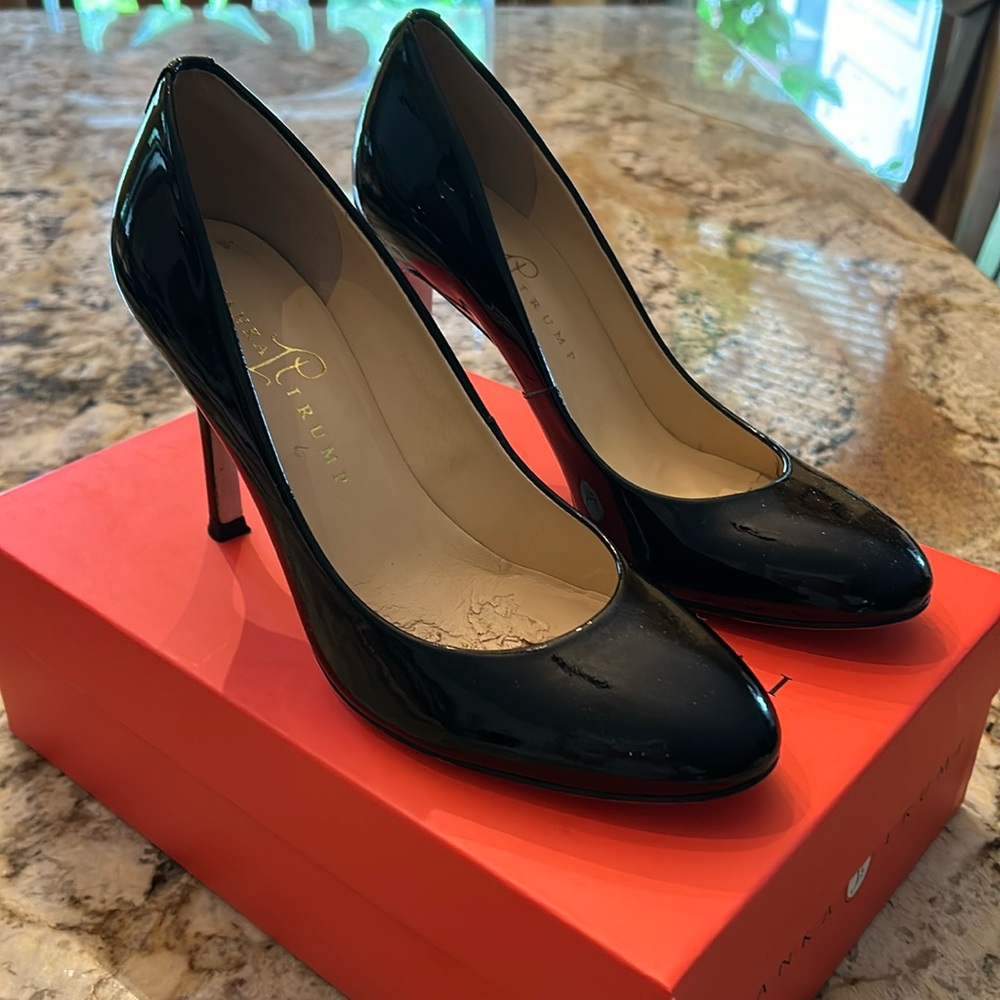 Black patent leather heels.